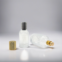 Fabricant à vendre Pompe de pulvérisation au design unique Bouteille en verre de parfum en forme de cylindre rond de 50ml