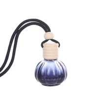 JH149 Bouteille de parfum de voiture suspendue en forme de citrouille noire-Diffuseur d'huiles essentielles, désodorisant pour voiture d'aromathérapie, cadeau unique