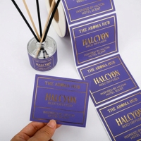 Étiquettes de parfum personnalisées en feuille d'or estampée à chaud bleue, autocollants adhésifs résistants à l'alcool et imperméables pour flacons de parfum