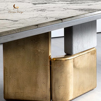 Table à manger de luxe en marbre, base métallique unique, plateau ovale en pierre, taille personnalisée, mobilier de salle à manger pour villa, décoration artistique moderne