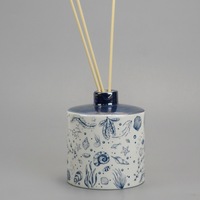 Diffuseur de parfum en céramique en gros, bouteille blanche émaillée motif coquillage, ensemble d'aromathérapie pour la maison avec bâtonnets en rotin, OEM