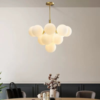 Lustres modernes de luxe léger pour salons, escaliers, salles à manger, hôtels, fabrication sur mesure directe d'usine et lampes en cuivre.
