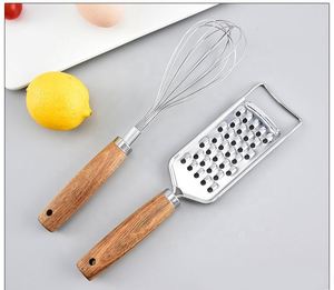 Household <b>Kitchen</b> <b>Gadgets</b> Wooden Handle Whisk Stainless Steel Ice Cream Spoon Pizza Knife Garlic Press and Planer Set - Product Image 4