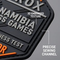 Badge en caoutchouc PVC personnalisé OEM ODM, découpé sur mesure, durable, gaufré, pour équipements de plein air, vêtements de sport et équipes