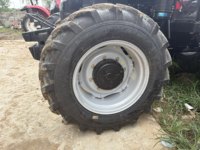 Tracteur agricole à roues 4x4 de 80 CV avec boîte de vitesses à 12 rapports et auvent multifonctionnel pour travaux sur rizières sèches
