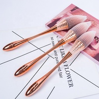 Pinceau de maquillage professionnel de luxe à marque privée, en poils synthétiques véganes de haute qualité, avec manche en plastique rose doré, pour poudre libre
