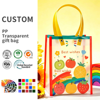 Kleurrijke fruit regenboog gematteerde duurzame PP draagtas transparant met geel handvat voor cadeaus