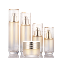 Nouveau dégradé or bouteille Toner Lotion Essence cosmétique verre matériau d'emballage bouteille séparée pressage bouteille portable