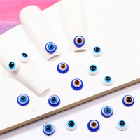 Offres Spéciales 3D breloques monstre démon mauvais yeux bleu résine yeux de poisson mixte ongles diamant paillettes plastique Nail Art accessoires