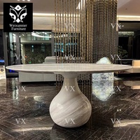 Ensemble de salle à manger 10 places au design nordique moderne avec grand dessus en marbre table et chaises rondes en bois massif de Guangzhou