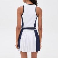 Großhandel Damen Kontrast-Farben Plissiertes Tenniskleid Hochelastisches Spandex-Polyester Atmungsaktive Outdoor-Sportbekleidung