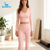 Ensemble de yoga pour femme à découpes, haut court à manches longues et pantalon évasé taille haute, tenue de fitness deux pièces, vêtements de sport doux et extensibles