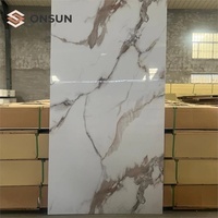 ONSUN Panneaux TV Bon marché Panneau moderne avec feuille de marbre UV Plaques de revêtement flexibles en PVC Panneau mural intérieur en polyuréthane