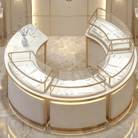 Vitrine d'îlot pour bijoux, ronde et incurvée, avec cadre doré champagne et éclairage LED, pour magasin de diamants