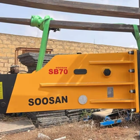 Marteau hydraulique SB70 pour excavatrices (16-21 tonnes) avec burin de 155 mm, accumulateur automatique, garantie 1 an, jaune, 1507 kg, emballage en bois