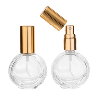 Flacon de parfum rond OEM de 10 ml, flacon pulvérisateur en verre, contenants cosmétiques de beauté, vaporisateur de voyage rechargeable portable