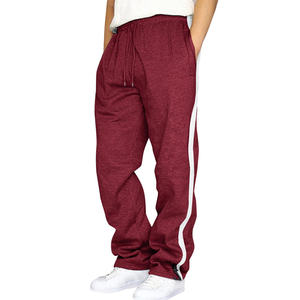 Pantalon en molleton de coton pour homme avec poches latérales, coupe décontractée, taille élastique, grandes tailles disponibles, pour usage décontracté et loungewear. - Product Image 1