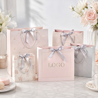 Sacs shopping en papier de luxe imprimés sur mesure avec poignées en corde, sacs d'emballage cadeau pour boutique, bijouterie et usage commercial