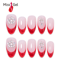 Faux ongles à presser rouge pailleté, forme amande moyenne, avec motifs flocons de neige en strass, 32 pièces