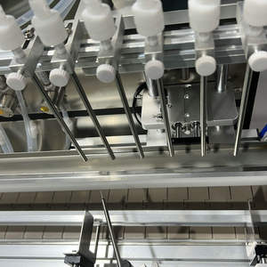 Machine de remplissage de liquides à pompe magnétique à 6 têtes en acier inoxydable, automatique, haute précision, pour bouteilles, 380V - Product Image 2