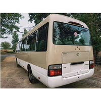 Mini-bus Toyota Coaster d'occasion 30 places, essence, importé du Japon, pour la vente aux entreprises de tourisme et de location