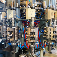 Machine de soufflage-remplissage-bouchage de blocs combinés PET à commande servo synchrone pour bouteilles en plastique de boissons et d'eau