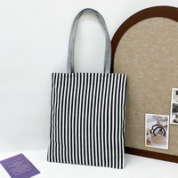 Sac fourre-tout portable noir et blanc uni avec fermeture éclair, grande capacité, en toile, décontracté, à bandoulière, pour le shopping et les voyages, pour femme, style Normcore, unisexe