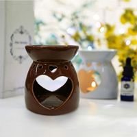 Coeurs Offre Spéciale, brûleur à huile en céramique creux en gros fondeur de cire en céramique lampe chauffante bougies brûleurs d'encens à l'huile essentielle
