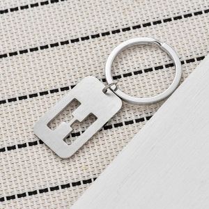 Porte-clés personnalisé en métal ajouré avec 26 lettres et pendentif plaqué chien brossé pour clés de voiture, cadeaux promotionnels - Product Image 4