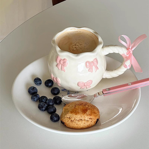 批发Ins韩式陶瓷咖啡杯不规则压花粉色蝴蝶结设计心形商务促销礼品 - Product Image 6