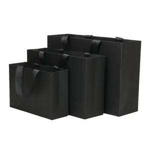 Bolsas de embalaje de cartón con asa de cinta impresa personalizada, color negro mate, para compras de papel de regalo de lujo con logotipo - Product Image 1