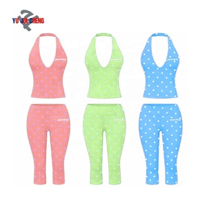 Ensemble deux pièces tendance 2026 pour femme : haut court dos nu à pois et pantalon capri taille haute pour l'été - Product Image 4