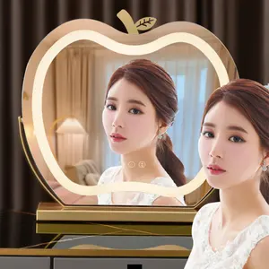 China's hot sales of Apple modeling desktop makeup light mirror with light emitting diode complement mirror lamp