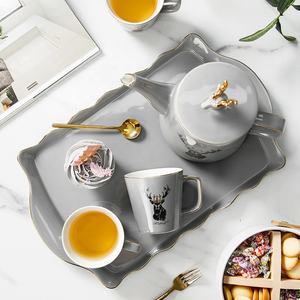 Ensemble théière et tasses en céramique pour salon, style nordique moderne et simple, couleur émaillée - Product Image 1