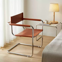 Fauteuil cantilever moderne nordique en cuir de luxe léger pour la maison, l'hôtel, le café, la réception, la salle d'attente et les espaces de loisirs