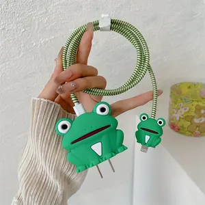 Étui de protection pour <span class=keywords><strong>chargeur</strong></span> en silicone grenouille mignonne pour <span class=keywords><strong>IPhone</strong></span> 11 <span class=keywords><strong>12</strong></span> 13 14 15 18W-20W accessoires de couverture de <span class=keywords><strong>chargeur</strong></span> de Protection de charge rapide - Product Image 1