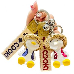 Wholesale Resin 3D Cartoon Happy Duck Keychain Cute Woven Straw Hat Duck Exquisite Accessories Bag Pendant Gift <b>Key</b> <b>Chain</b> - Product Image 1