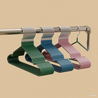 Support suspendu pour vêtements secs Cintre noir pour vêtements pour adultes Cintres en plastique + métal Organisateur de vêtements pour la maison