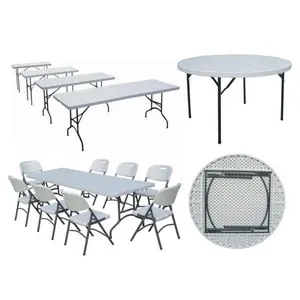 White plastic outdoor folding dining table and chair