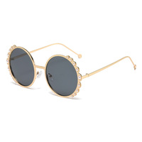 Lunettes de soleil pour femmes de la mode européenne et américaine Lunettes de soleil à monture ronde avec verres UV400 Optimal pour les enfants