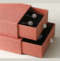 Boîte à bijoux écologique imperméable avec poignée perlée et tiroir coulissant pour ranger bagues, boucles d'oreilles et montres, rigide