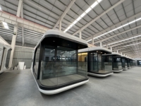 Maison capsule spatiale préfabriquée à bas prix Petite maison avec système intelligent pour hôtel Mooncabin et location de