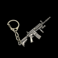 Fabricant en gros de mini porte-clés en métal en forme de pistolet, porte-clés en métal personnalisé en forme de pistolet