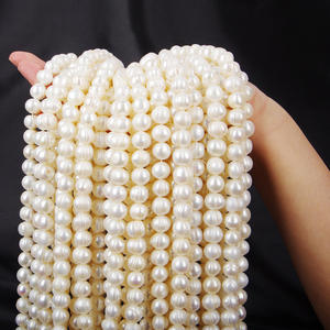 Collier de perles d'eau douce naturelles de 10-11 mm, presque parfaites, de qualité AAAA, vente en gros et au détail auprès du fabricant - Product Image 1