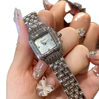 Montre à quartz pour femme Scottie Luxury, boîtier carré, bracelet de 20 mm, cadran en nacre coloré, design élégant et nouveau