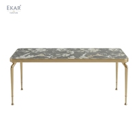 Table à manger ronde moderne, surface aspect pierre grise, base cylindrique superposée pour salle à manger