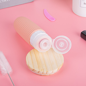 Ensemble de flacons distributeurs en silicone modèle QC-A5, best-seller transfrontalier, portable, anti-fuite, moulé par injection, pour usage domestique et soins du visage - Product Image 4