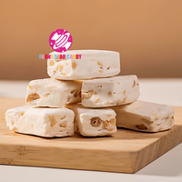 Vente en gros Bonbons nougat à l'arachide Bonbons emballage individuel en-cas chinois personnalisés Bonbons mous à mâcher au lait d'arachide