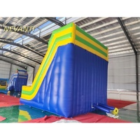 Mur d'escalade gonflable commercial à double toboggan en PVC pour événements extérieurs