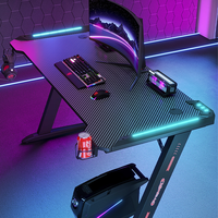 Mesa de Juegos de ordenador de oficina en casa de escritorio de deportes electrónicos de fibra de carbono personalizada de fábrica con luces LED RGB
